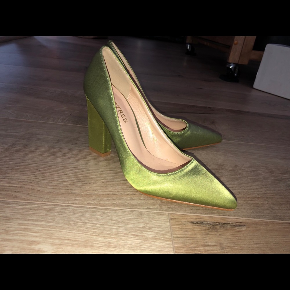 Green satin pumps